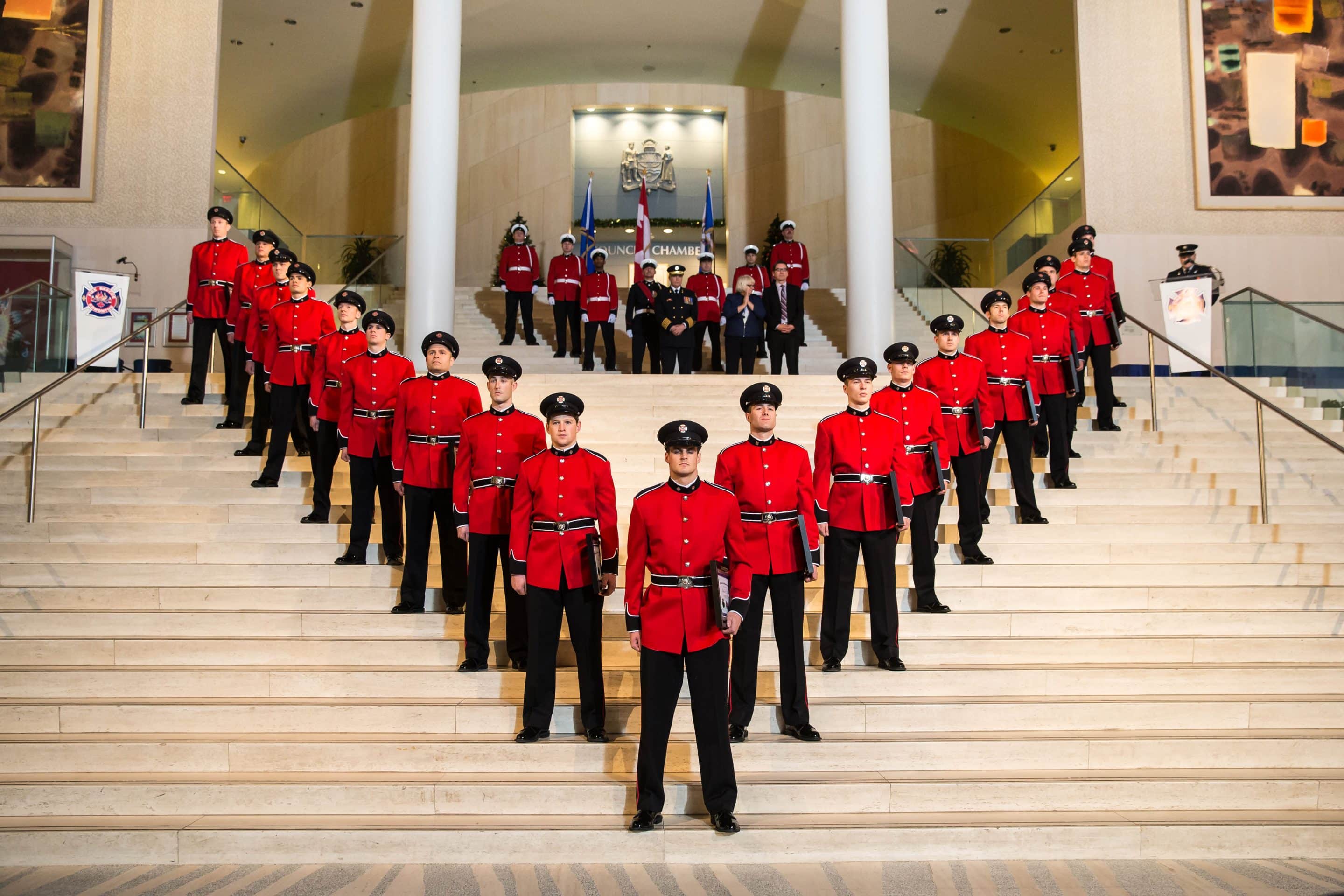 Formal photos for the graduating class of Edmonton Fire and Rescue on the steps of City Hall in Edmonton